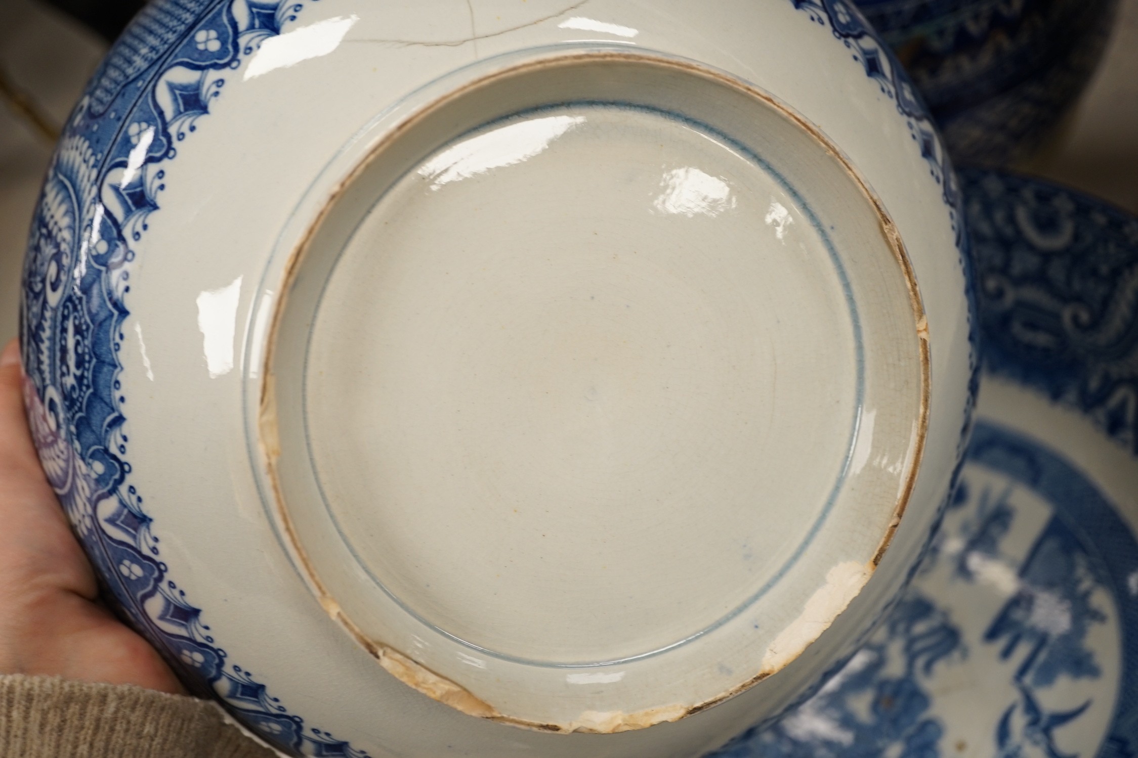 A pair of Delft blue and white candlesticks together with an 18th century Delft bowl, a Moroccan pottery jar with cover, and two pearlware bowls